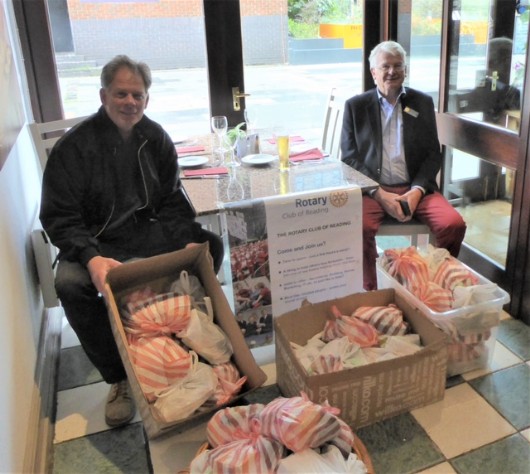 Nick Harborne CEO of the Refugee Support Group (L) and John Osborne from Reading Rotary displaying toiletry bags for Refugees arriving in Reading